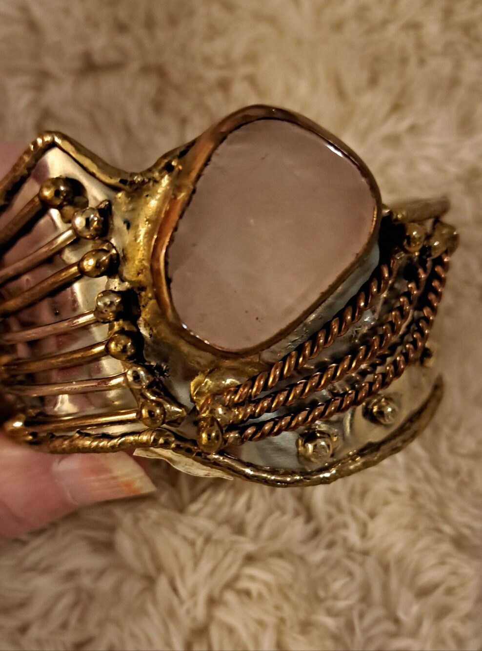 Handcrafted Gold-Tone Cuff Bracelet with Rose Quartz Accent